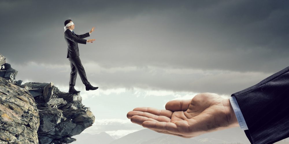 Blindfolded businessman standing on edge and making step to gap. Mixed media